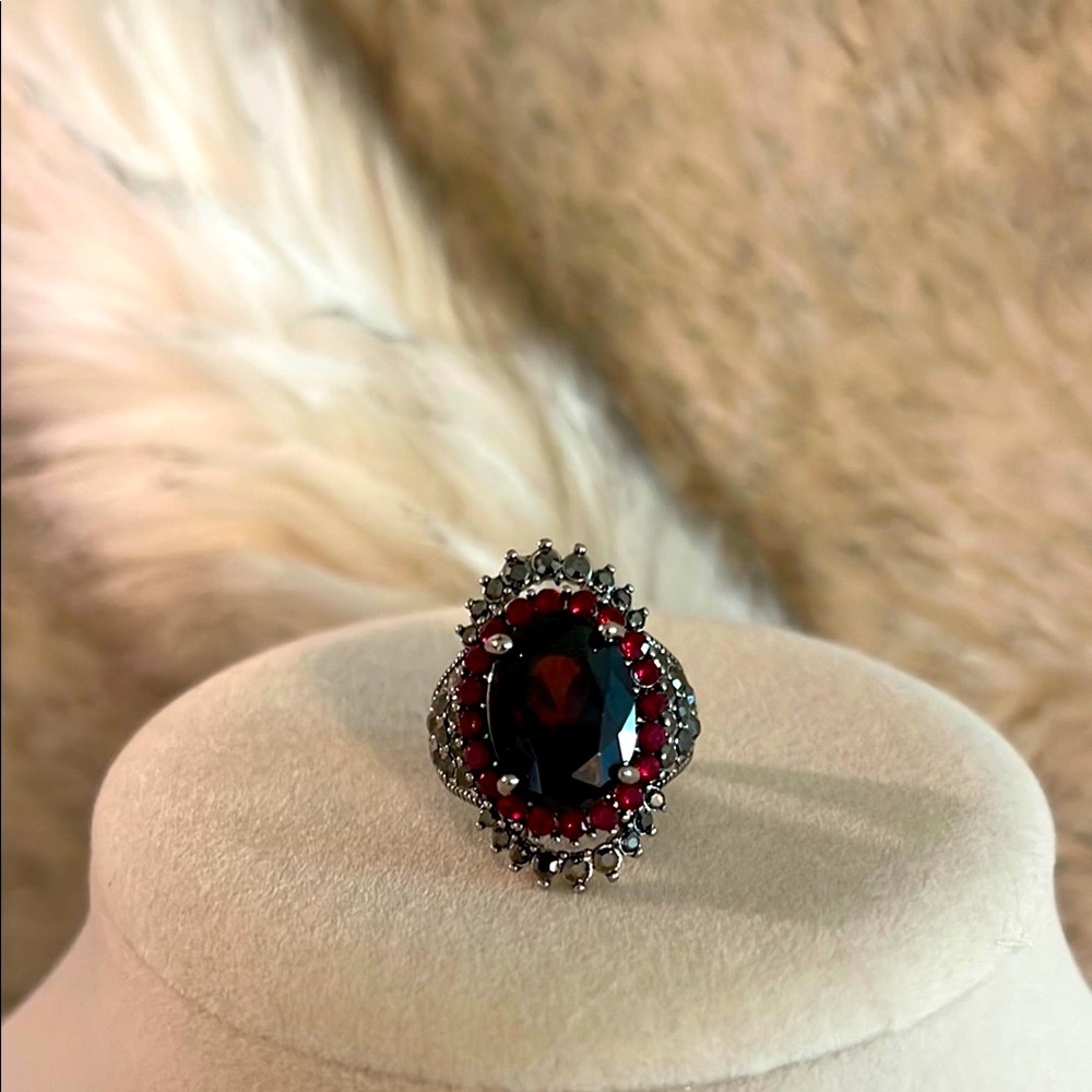 Gorgeous synthetic Ruby rang with topaz accents size 6